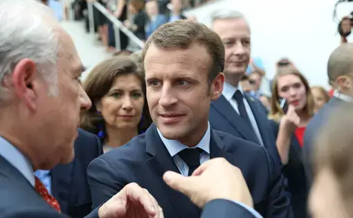 OECD Forum 2018 - Arrival of Emmanuel Macron - President of France. Image by Organisation for Economic Co-operation and Develop / Ceative Commons. France, 2018.